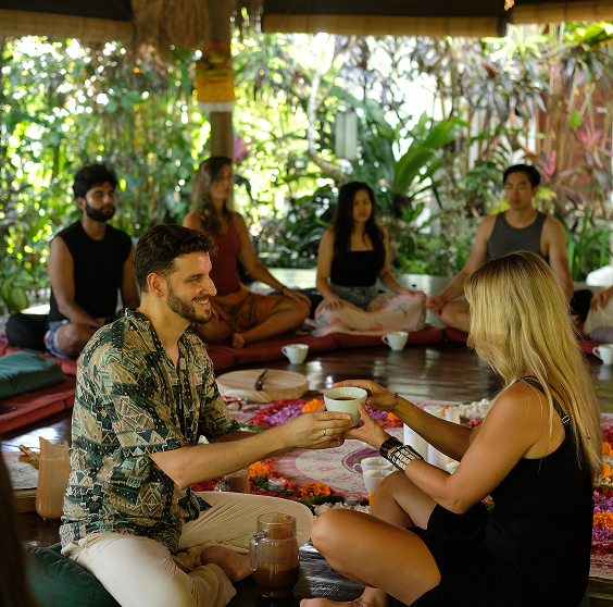 Sharing cacao during an InnerCamp ceremony